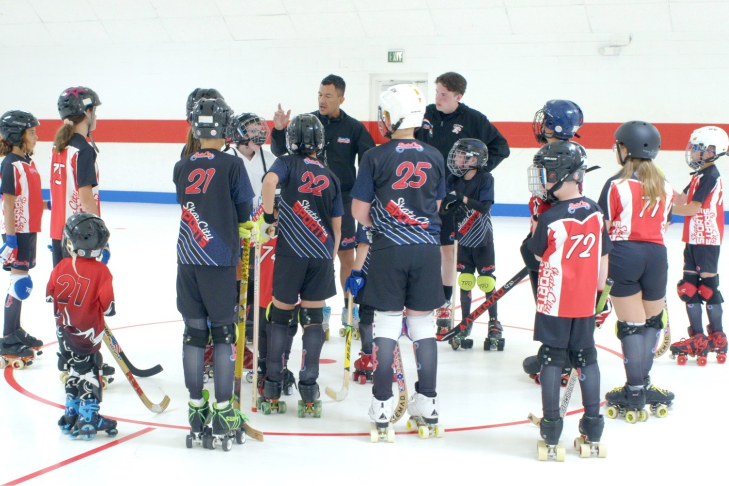 Coaches teaching ball hockey at Skate City Sports in Colorado